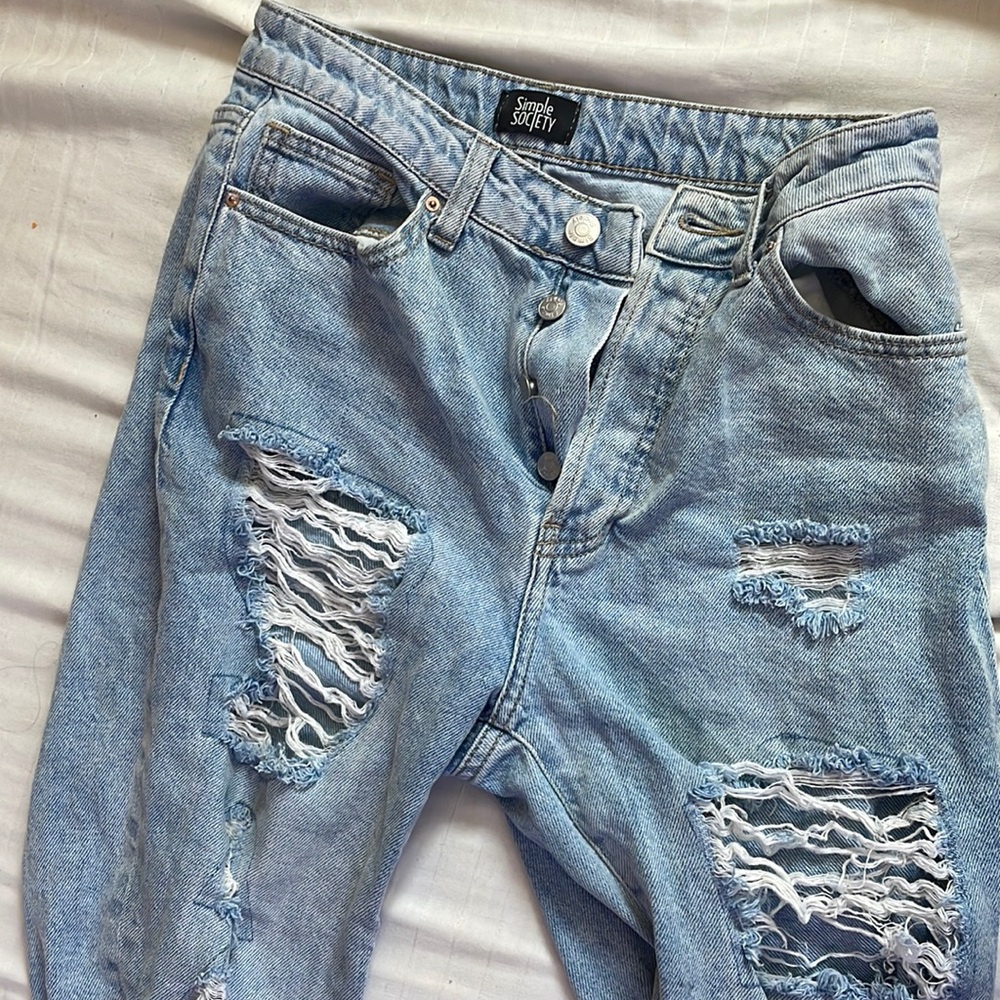 hugh waisted mom jeans with holes